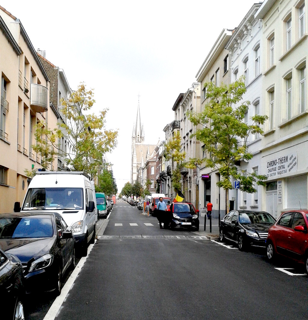 The street where Hybrid Studios is located – rue de l’Intendant 111. The church at the top of the hill is the catholic church of Église Saint-Rémi. Hybrid studies is to the right side and not visible in the photo .