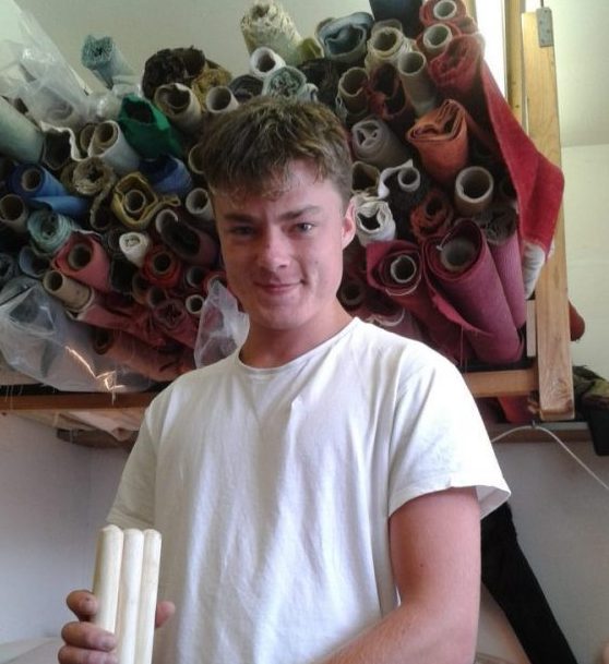 Ellis Mace in the workshop on Stockwell Street/Cowley Rd, Oxford holding our finished props for the Garden Dance (Sept 2018 #gardendance). Ellis works at - W.S.Cooke Upholsters who repair and restore furniture, as well as finishing these 1.2 meter wooden poles with which to we'll dance. Thank-you! (Photo 2018-08-31 13.09.22)