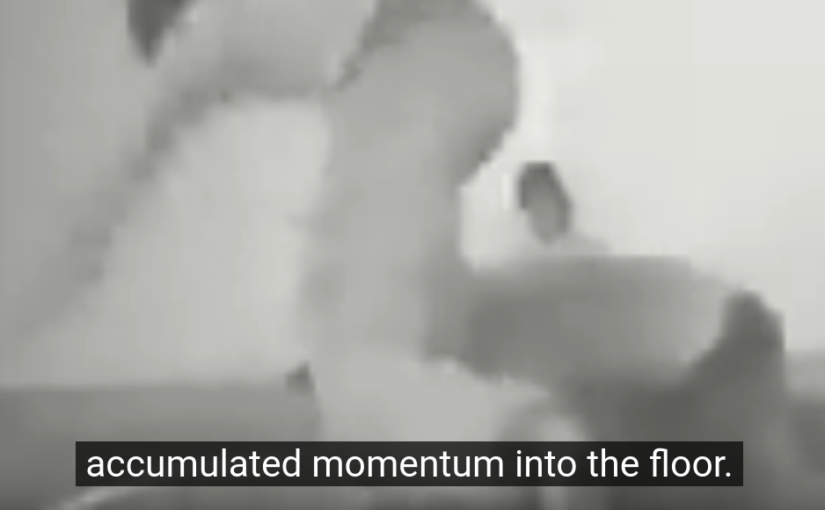 Still from Contact Improvisation 1972 film with the words 'accumulated momentum into the floor'