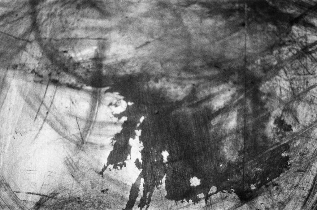 Residuals #1 image 0016. Artists Andrew Wood & John Hazel. Charcoal on paper. Created 16 January 2024 at Old Fire Station dance studio, Oxford. UK. Photo: Andrew Wood. Black & white 35mm film photograph.