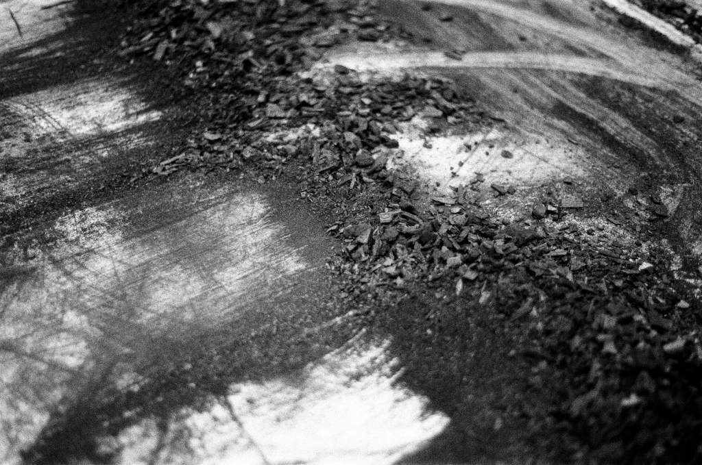Residuals #1 image 0022. Artists Andrew Wood & John Hazel. Charcoal on paper. Created 16 January 2024 at Old Fire Station dance studio, Oxford. UK. Photo: Andrew Wood. Black & white 35mm film photograph.
