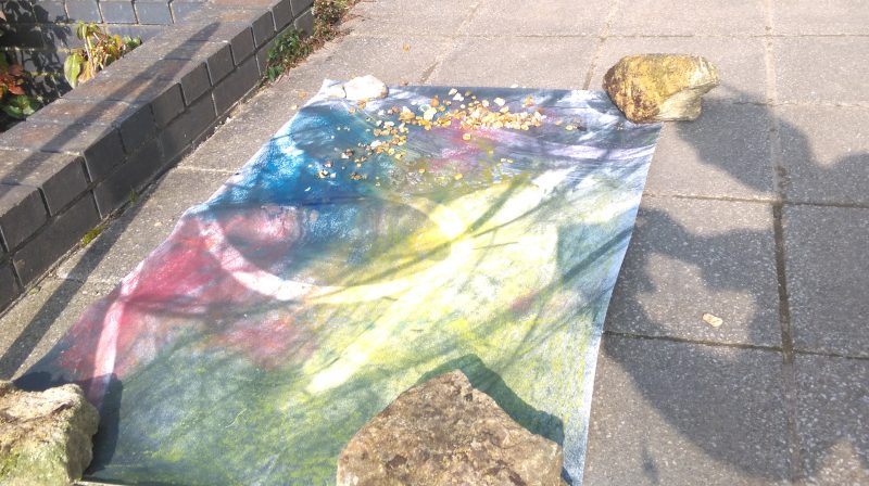 Tinted: painted photograph from Residuals #1 drying outside Beckley Village hall, Friday 22 March 2024.